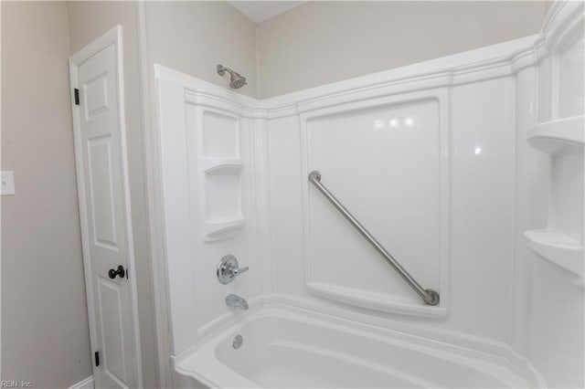 bathroom with tub / shower combination