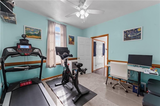 workout room featuring ceiling fan