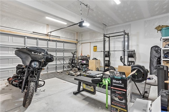 garage featuring a garage door opener