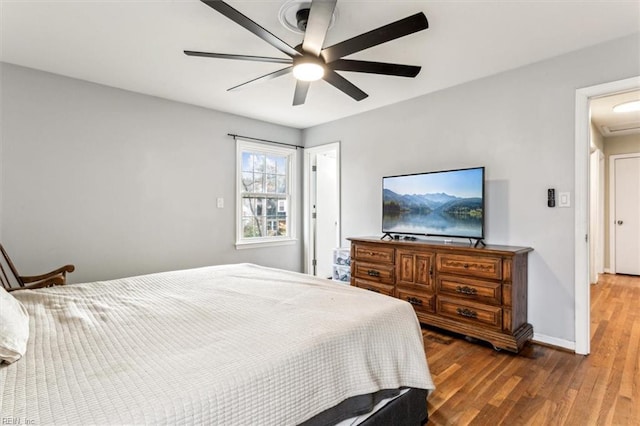 bedroom featuring ceiling fan and hardwood / wood-style flooring