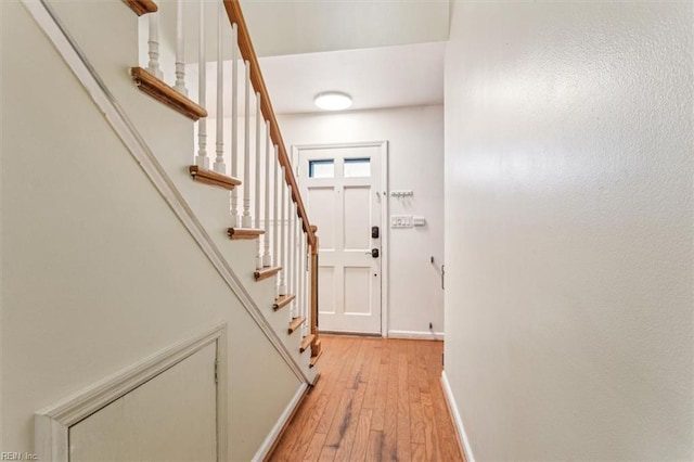 doorway with light hardwood / wood-style floors