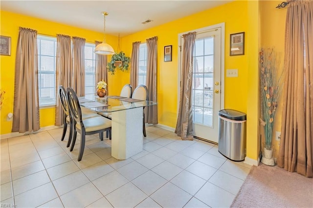 dining room with light tile patterned floors