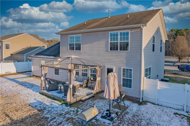 snow covered property featuring an outdoor hangout area