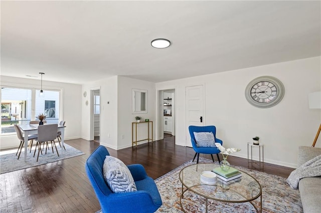 living room with dark wood-type flooring