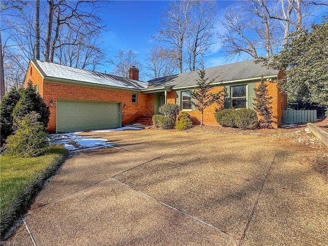 single story home with a garage