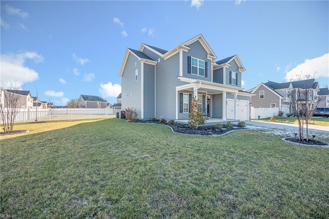 view of front of house with a front lawn and a garage