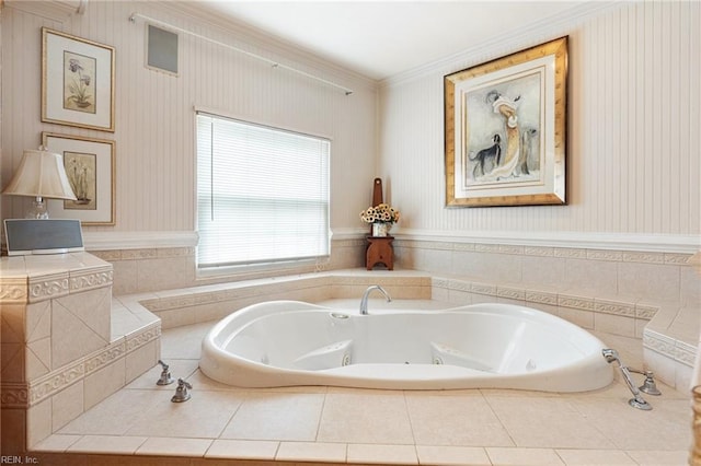 bathroom featuring tiled tub and ornamental molding