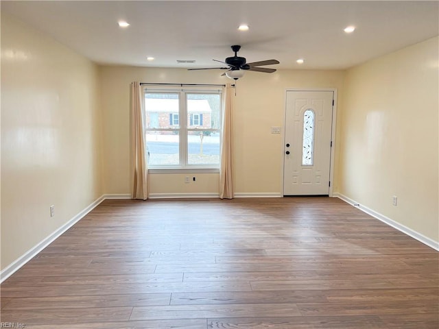 foyer featuring ceiling fan and wood-type flooring