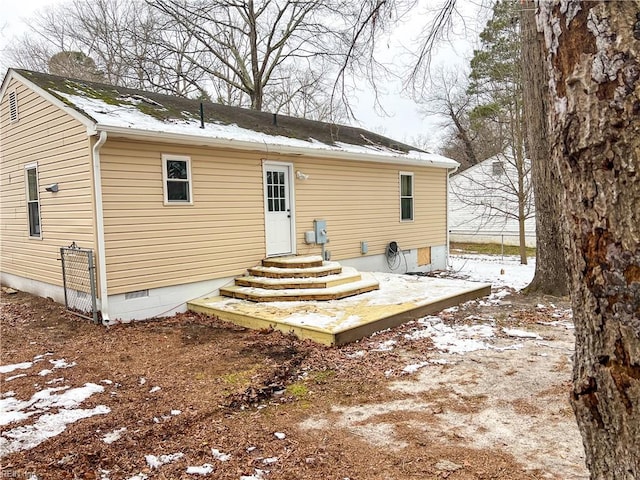 view of snow covered property