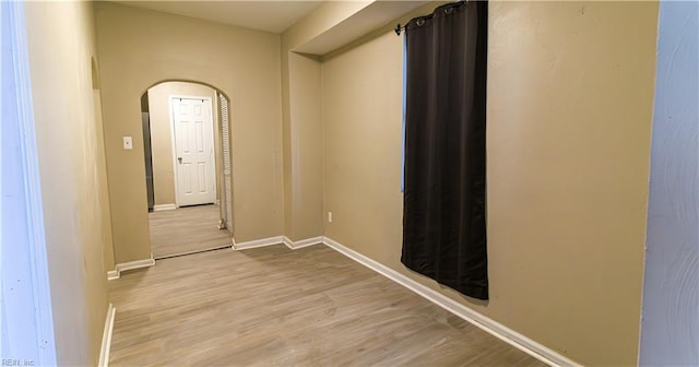 spare room with light hardwood / wood-style floors