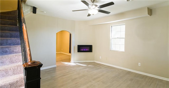 interior space featuring hardwood / wood-style flooring and ceiling fan