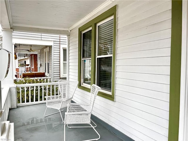 balcony featuring a porch