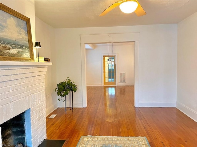 hallway featuring wood-type flooring