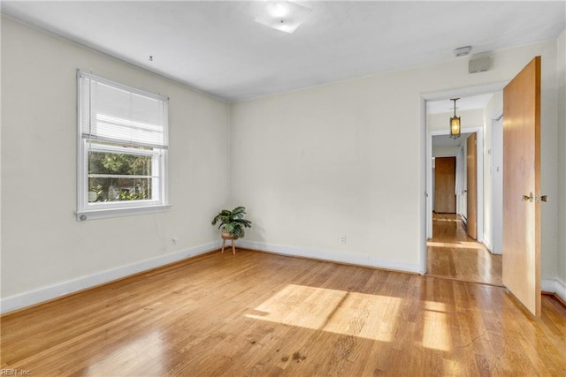 empty room featuring light hardwood / wood-style floors