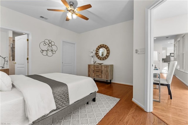 bedroom featuring ceiling fan and wood-type flooring