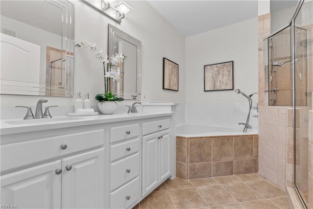 bathroom featuring vanity, tile patterned floors, and independent shower and bath