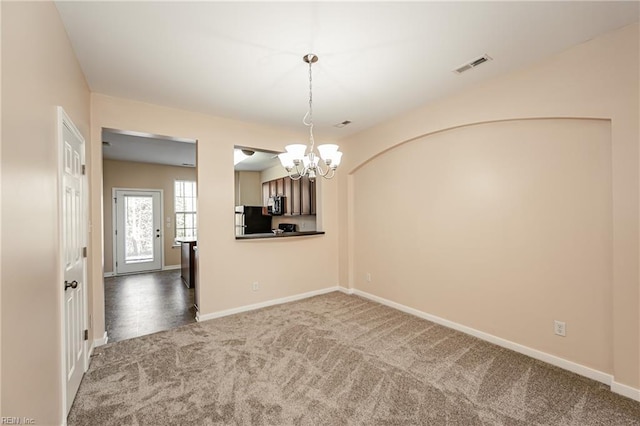 interior space featuring a chandelier