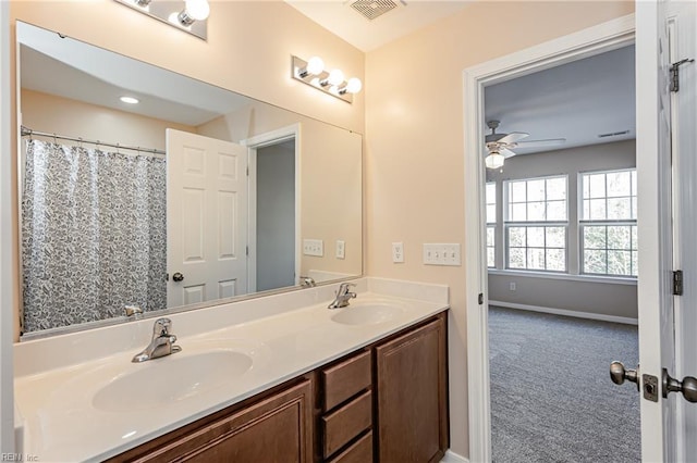 bathroom with vanity and ceiling fan