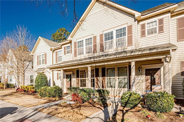 view of property featuring a porch