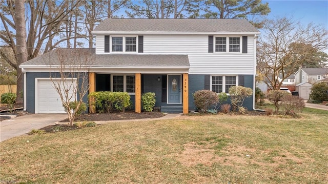 view of property with a front lawn and a garage