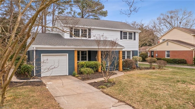 view of front property with a front lawn and a garage