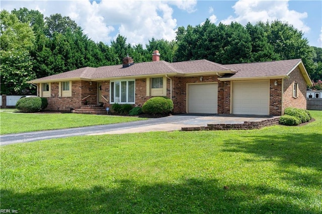 ranch-style house with a front yard and a garage