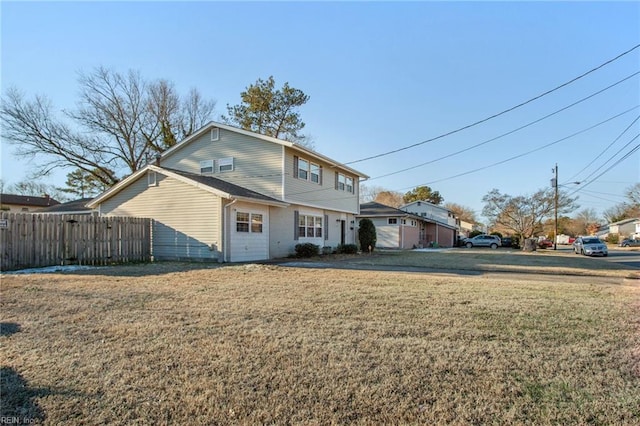 view of front of home with a front lawn