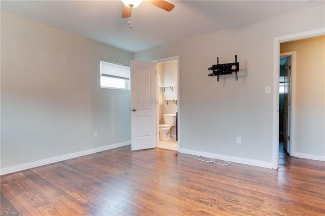 unfurnished room featuring ceiling fan and wood-type flooring