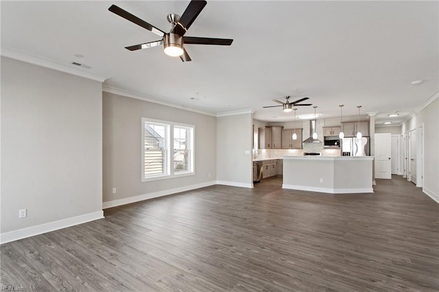 unfurnished living room with ceiling fan, crown molding, and dark hardwood / wood-style flooring