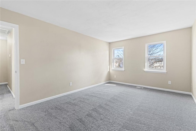 spare room with carpet flooring