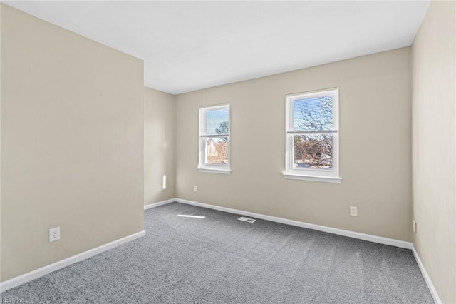 view of carpeted spare room