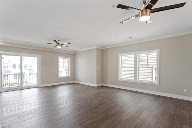 spare room with ceiling fan, crown molding, and dark hardwood / wood-style flooring