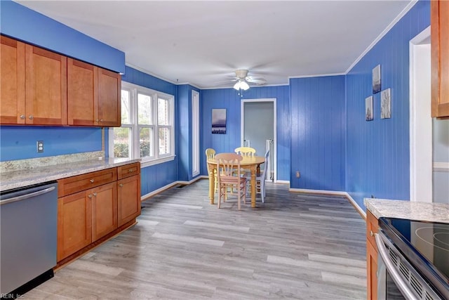 kitchen featuring light wood-type flooring, ceiling fan, light stone counters, stainless steel dishwasher, and crown molding