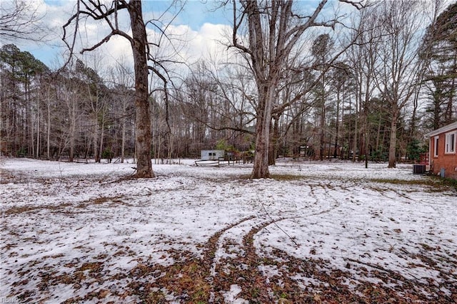 view of yard covered in snow