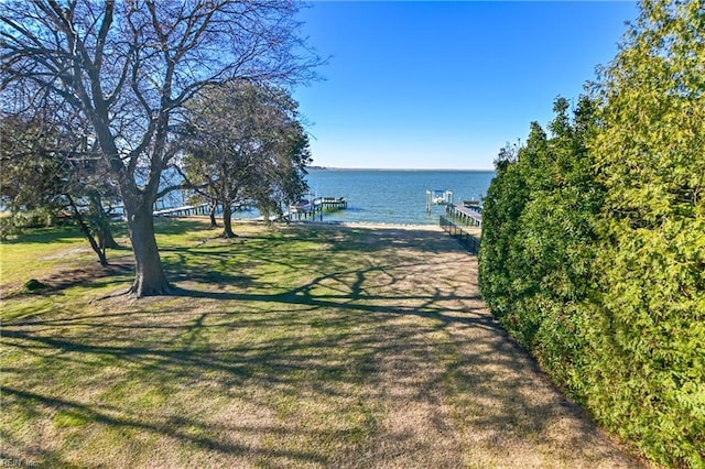 property view of water featuring a boat dock