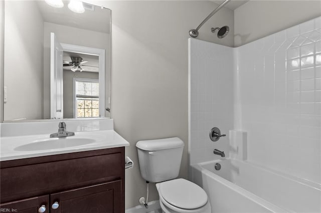 full bathroom with ceiling fan,  shower combination, vanity, and toilet