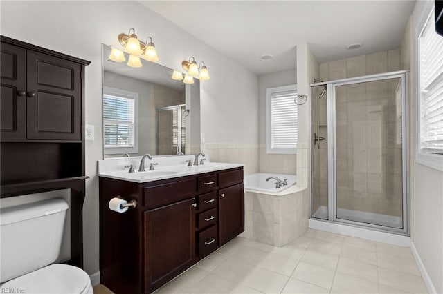 full bathroom featuring separate shower and tub, tile patterned flooring, vanity, and toilet