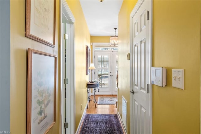 hallway featuring hardwood / wood-style floors