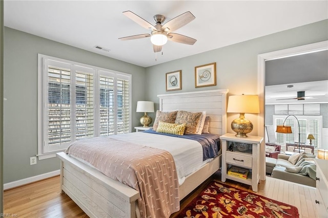 bedroom featuring ceiling fan and hardwood / wood-style floors