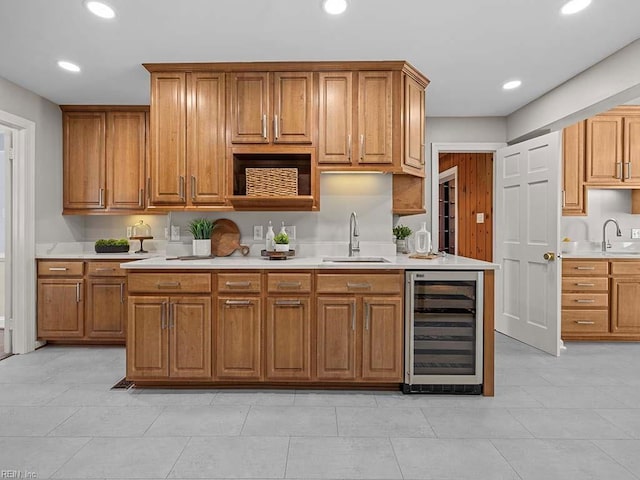 kitchen with sink and beverage cooler