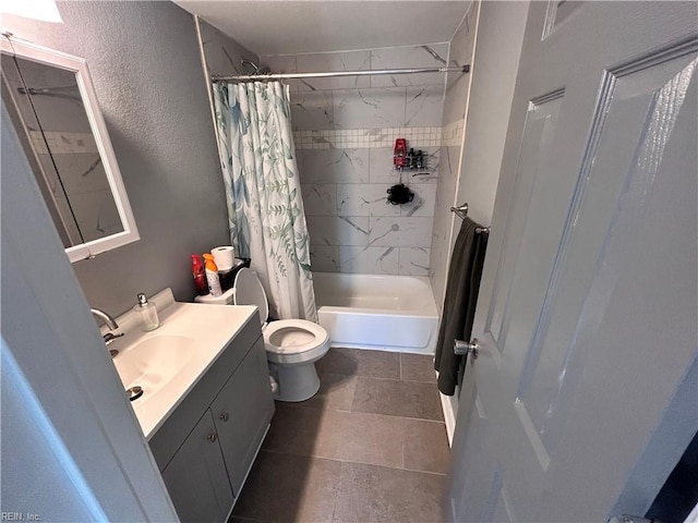 full bathroom featuring shower / bath combo, vanity, and toilet