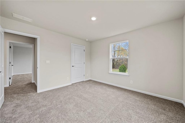 unfurnished bedroom with carpet flooring