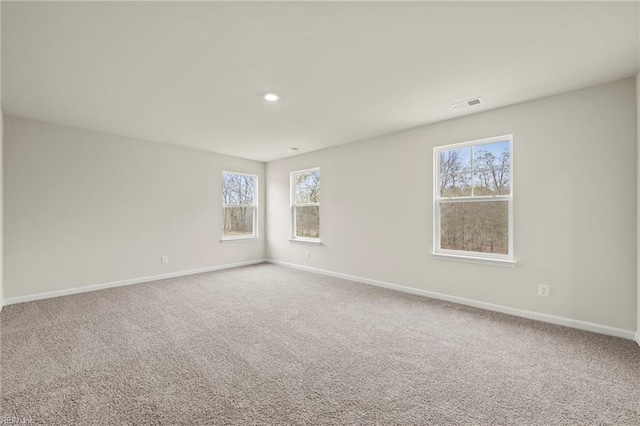 view of carpeted spare room