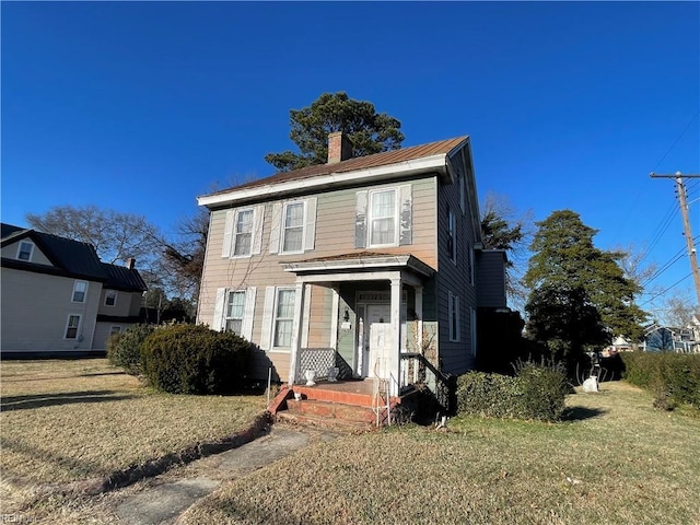 view of front of house featuring a front lawn