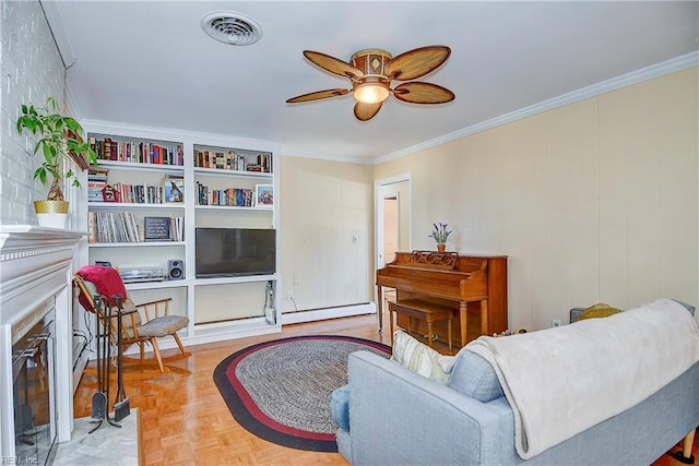 living room featuring light parquet flooring, ceiling fan, crown molding, and a baseboard heating unit