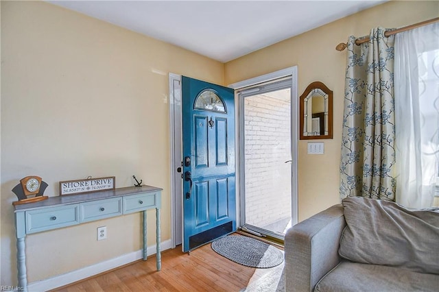 foyer with hardwood / wood-style flooring