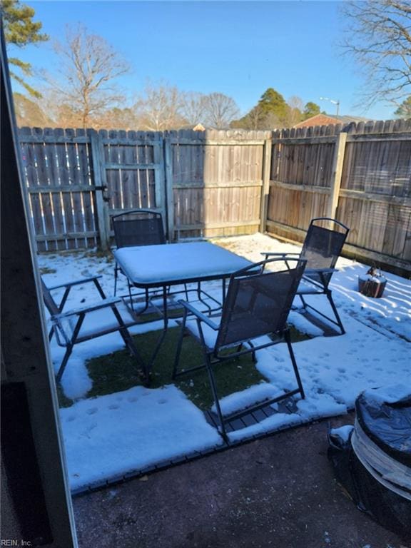 view of snow covered patio