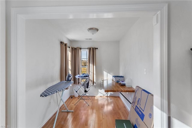 miscellaneous room featuring hardwood / wood-style flooring