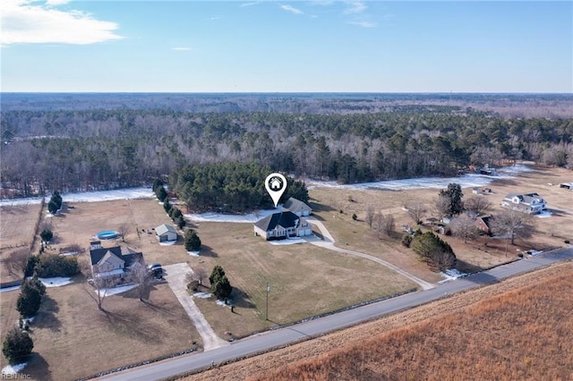 birds eye view of property featuring a rural view