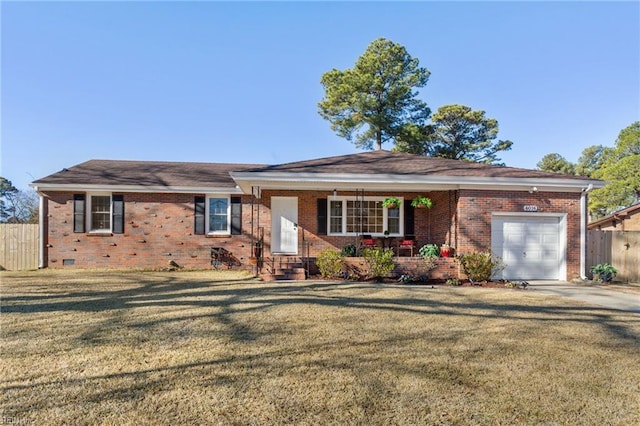 single story home with a porch, a garage, and a front yard